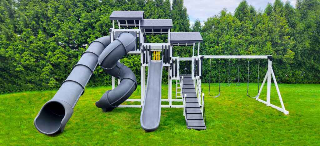 Custom Playground Equipment in Suwanee, GA installed in a spacious family backyard